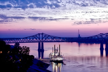 EB-5 Regional Center in Mississippi. Photo of fishing boat trawling on the Natchez River.